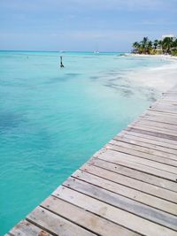 Scenic view of sea against blue sky