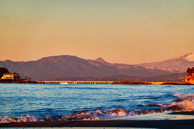 Scenic view of sea against sky during sunrise