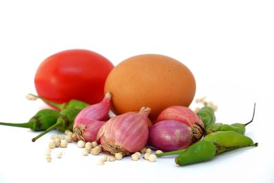 Close-up of fruits against white background