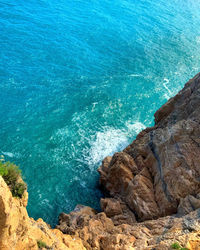 High angle view of rocks on beach