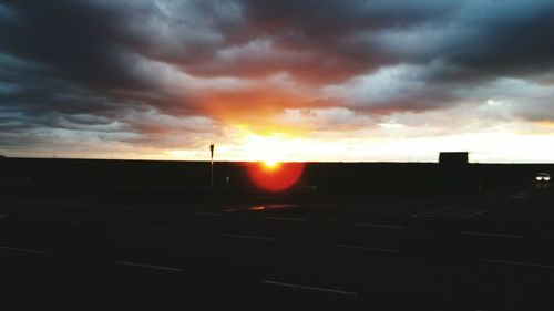 Scenic view of dramatic sky during sunset