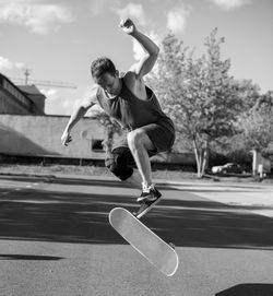 Full length of man skateboarding on skateboard