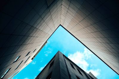 Low angle view of building against blue sky