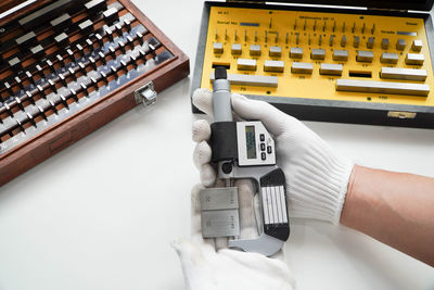 High angle view of man working on table