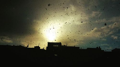 View of buildings at sunset