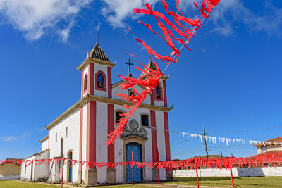 Old and simple colonial-style church decorated with ribbons for a religious celebration minas gerais