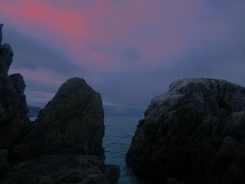 Scenic view of sea against sky at sunset