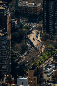 High angle view of street amidst buildings in city