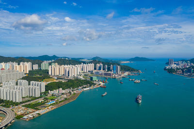 High angle view of city buildings at waterfront