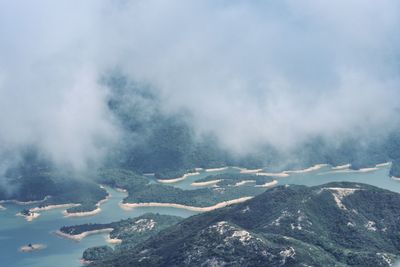 Aerial view of lake against sky during winter