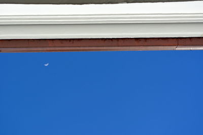 Low angle view of building against blue sky