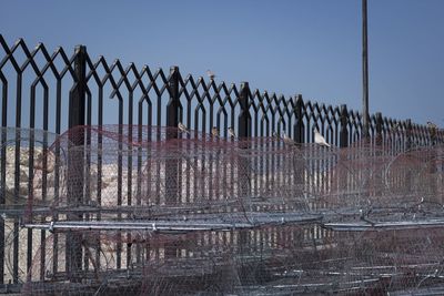 Metallic structure against clear sky