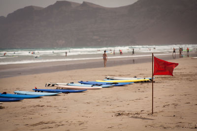 Scenic view of beach against mountains