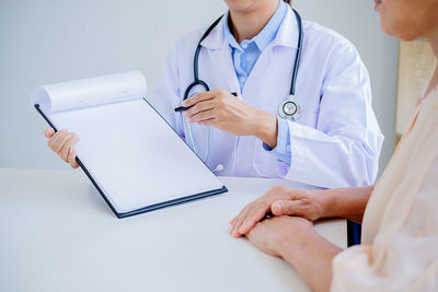 Doctor and patient on table