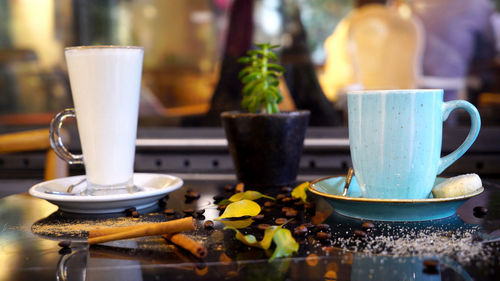 Close-up of coffee cup on table