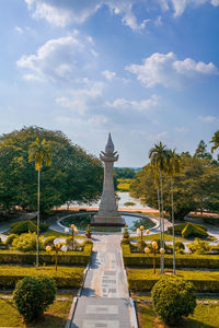 View of temple building against cloudy sky