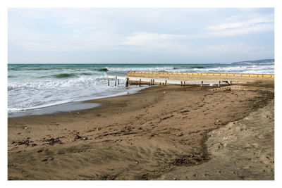 Scenic view of beach against sky