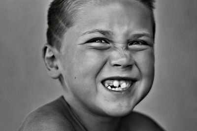 Close-up portrait of smiling boy