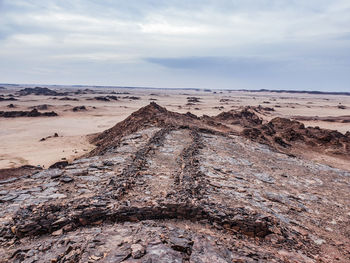 Scenic view of desert against sky