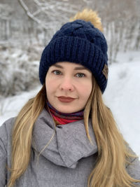 Portrait of woman wearing hat during winter