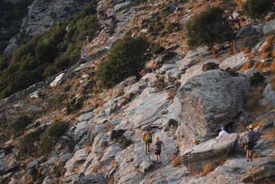 High angle view of people on rocks