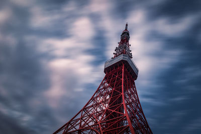 Low angle view of tower against cloudy sky