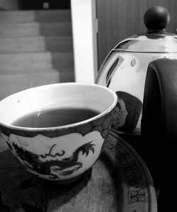 Close-up of coffee cup on table