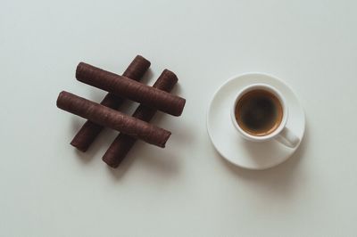 Close-up of coffee cup on table
