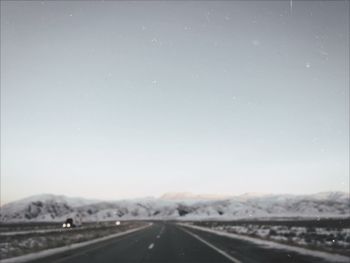 Country road passing through landscape