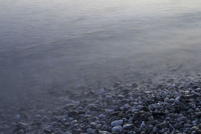 Close-up of pebbles on beach