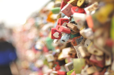 Close-up of padlocks hanging on metal