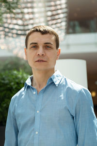 Portrait of young man outdoors