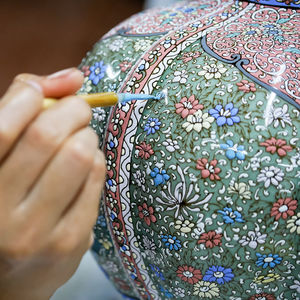 Midsection of woman holding multi colored candies
