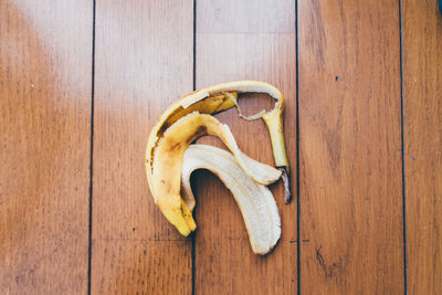 Directly above shot of banana peel on floorboard