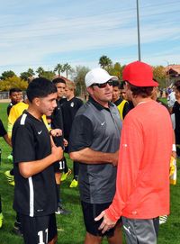 Men in traditional clothing against sky