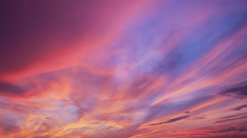 Low angle view of dramatic sky during sunset