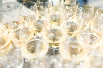 Close-up of alcohol in drinking glasses on table