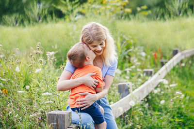 Mother and son on field