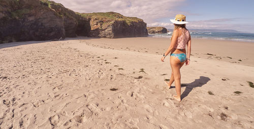 Full length of woman on beach