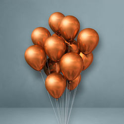 Close-up of balloons against white background