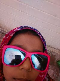 Portrait of girl wearing sunglasses