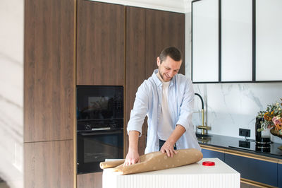 Portrait of young man working at home