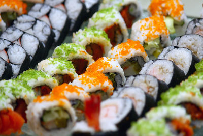 Full frame shot of sushi served in plate
