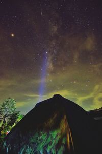 Low angle view of mountain against sky at night