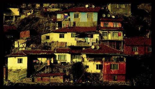 Houses in city at night