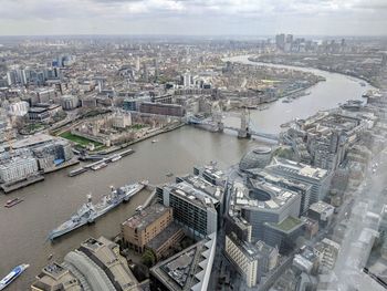 High angle view of river amidst buildings in city