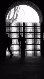 Silhouette of man in corridor