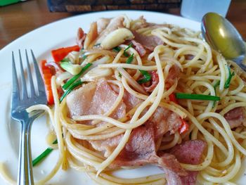 Close-up of noodles served on table
