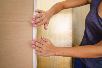 Close-up of woman holding hands