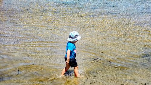 Full length of boy on beach